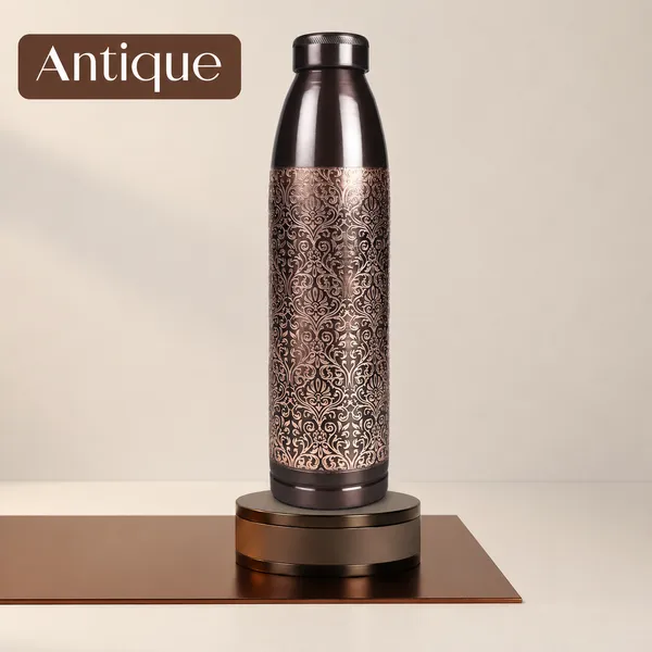 Close-up of engraving on a handcrafted copper bottle